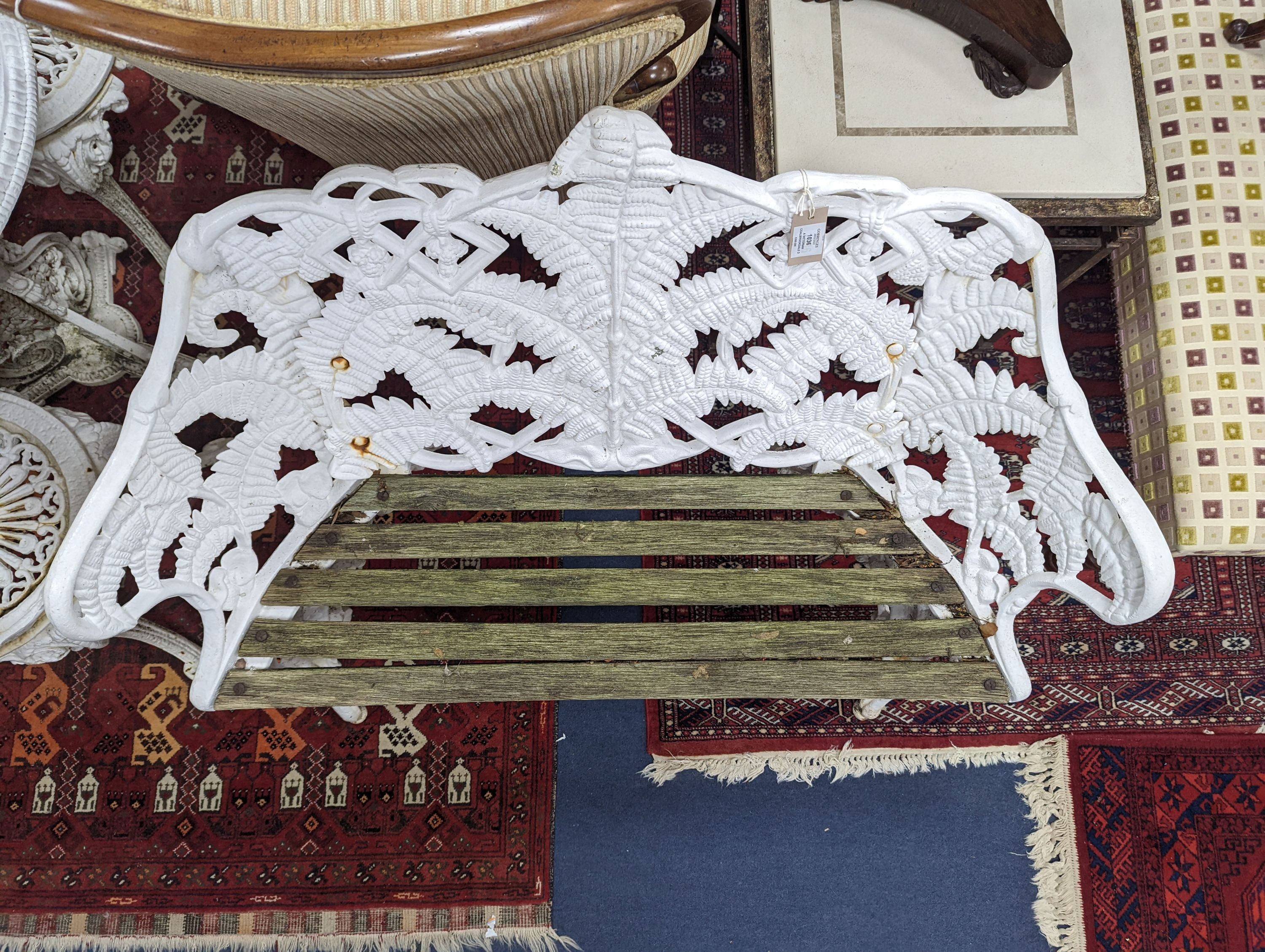 A Victorian Coalbrookdale design painted cast iron fern pattern garden bench, length 114cm, depth 44cm, height 90cm